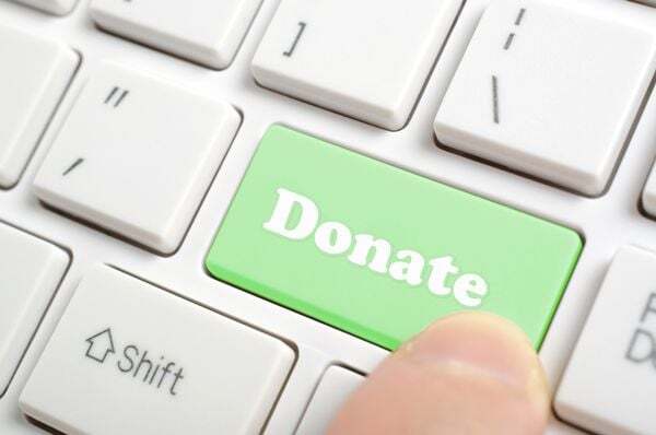 Laptop keyboard with the word "Donate"